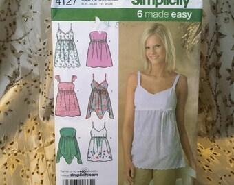 Simplicity 4127 pattern - sizes 12-14-16 -18-20 - 6 easy to make tunics, empire waistline, straps, bows ribbons and summertime is here.