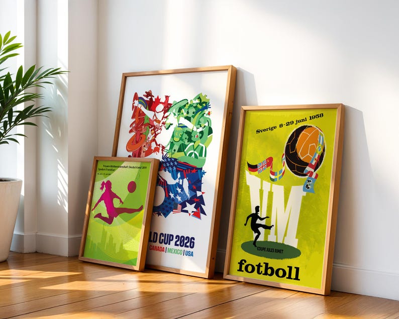 May include: Three framed posters featuring soccer themes. The left poster shows a silhouette of a player kicking a ball. The center poster displays colorful graphics with the text World Cup 2026 Canada Mexico USA. The right poster features a soccer ball and the text Sverige 8-29 juni 1958 VM fotboll.