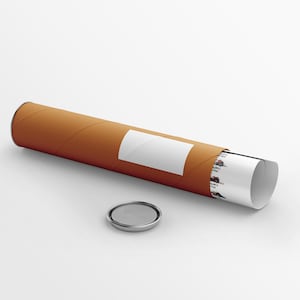 May include: A cylindrical brown cardboard mailing tube with a white rectangular label on the side. A rolled white paper document with small printed graphics is partially visible inside the tube. A separate circular metal cap lies nearby.
