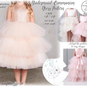 May include: A pink tulle dress pattern for girls, with four sizes available from 2 to 8 years. The pattern includes instructions for both knee-length and ankle-length dresses. The image shows a girl wearing a pink tulle dress with a sparkly bodice, and a close-up of the pattern pieces.