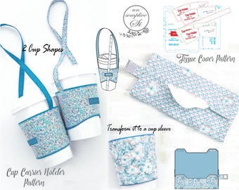 May include: A sewing pattern for a cup carrier holder and a tissue cover. The pattern includes instructions for making a cup sleeve. The pattern is printed on white paper with blue and pink floral designs. The text on the pattern reads "2 Cup Shapes", "Cup Carrier Holder Pattern", "Transform it to a cup sleeve", and "Tissue Cover Pattern".