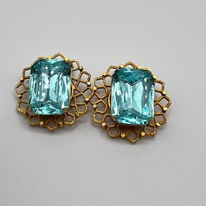 Vintage  clip on  earrings/ gold  tone filigree metal with aqua blue crystals/ wedding accessories./gift
