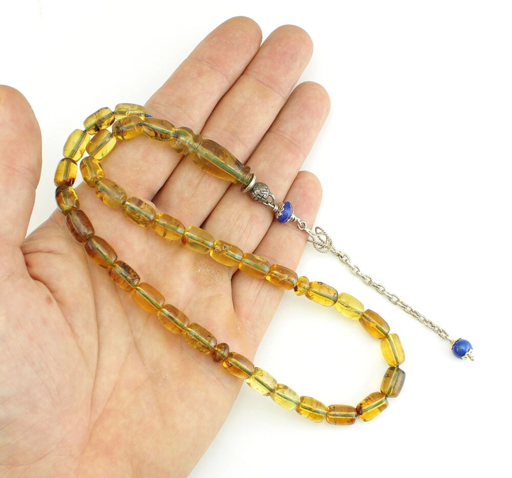 Traditional worry beads set made of selected Dominican amber and silver.
