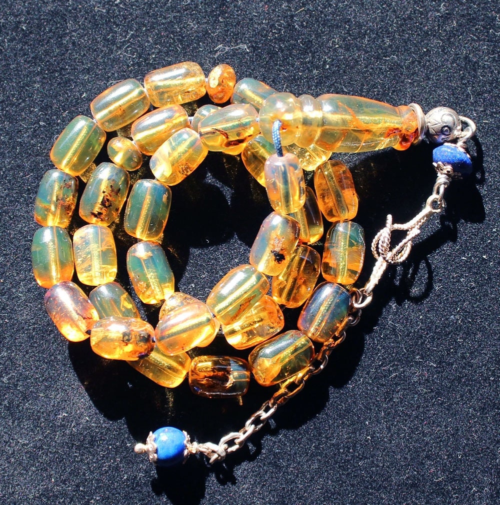 Traditional worry beads set made of selected Dominican amber and silver.