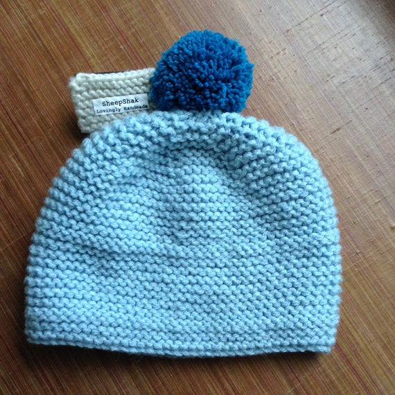 baby blue bobble hat