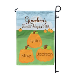 May include: A green and blue garden flag with the text "Grandma's Favorite Pumpkin Patch" and three pumpkins with the names "Lydia", "Missy", and "Jackson" written on them.