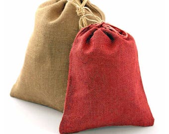 May include: Two burlap drawstring bags, one brown and one red. The bags are made of natural fabric and have a rustic look.