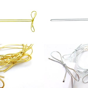 May include: A pack of gold and silver wire ribbon with bows. The ribbon is shown in both a straight and tied bow form.