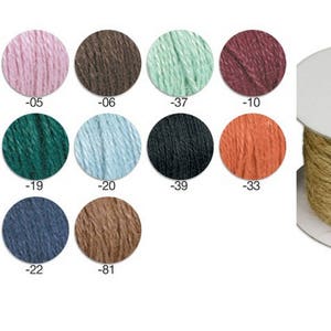 May include: A selection of 16 spools of twine in various colors, including white, beige, pink, brown, green, blue, black, red, and gray. The spools are arranged in four rows of four. The twine is a natural fiber, such as jute or hemp.
