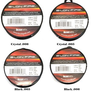 May include: Four spools of S-LON FIRE braided and fused bead thread. The spools are labeled with the color and size of the thread. The colors are Crystal .006, Crystal .005, Black .005, and Black .006. Each spool has a barcode and the text "BEADSMITH" printed on it.
