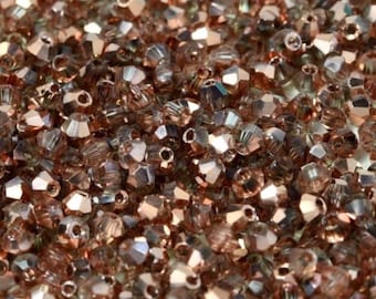 2mm Crystal Capri Gold, Chinese Bicone-72 pieces