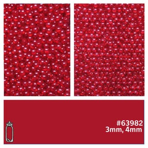 May include: A close-up image of a large quantity of small, red, round beads. The beads are arranged in a random pattern. The beads are 3mm and 4mm in size. #63982