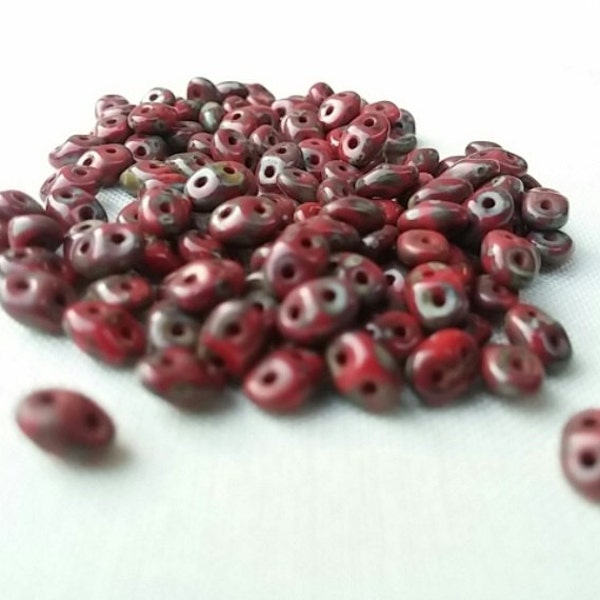 10g. Opaque Red Picasso, SuperDuo 2-hole bead 2,5x5mm 9320