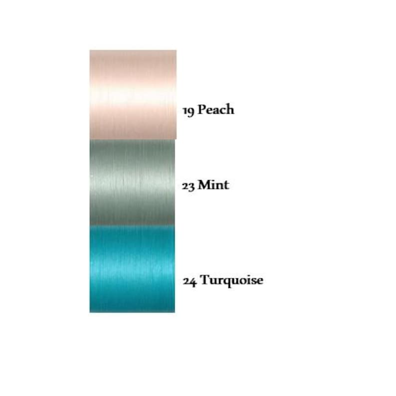May include: A vertical display of three fabric swatches. The top swatch is peach, the middle swatch is mint, and the bottom swatch is turquoise. The swatches are labeled with numbers and names: 19 Peach, 23 Mint, and 24 Turquoise.