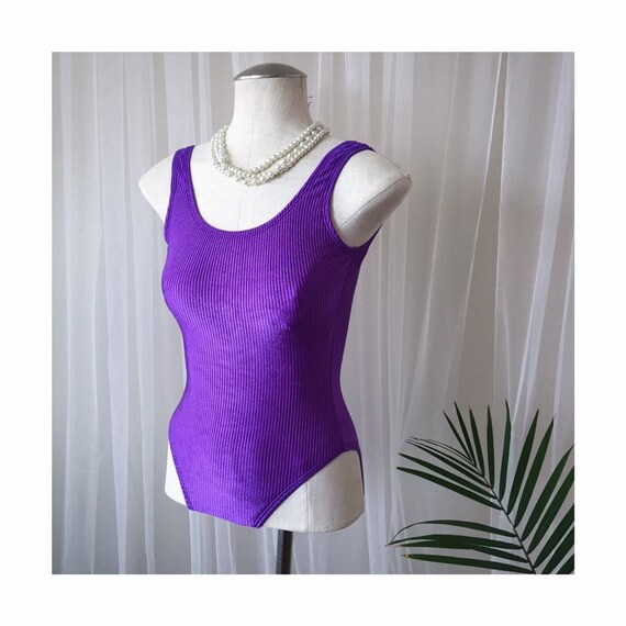 violet bathing suit