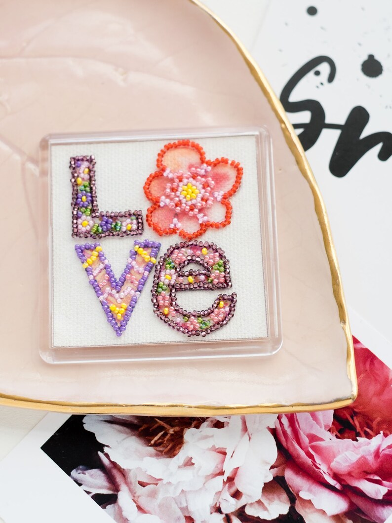 Declaration of love magnet bead embroidery kit with acrylic frame depicting the words L-O-V-E
