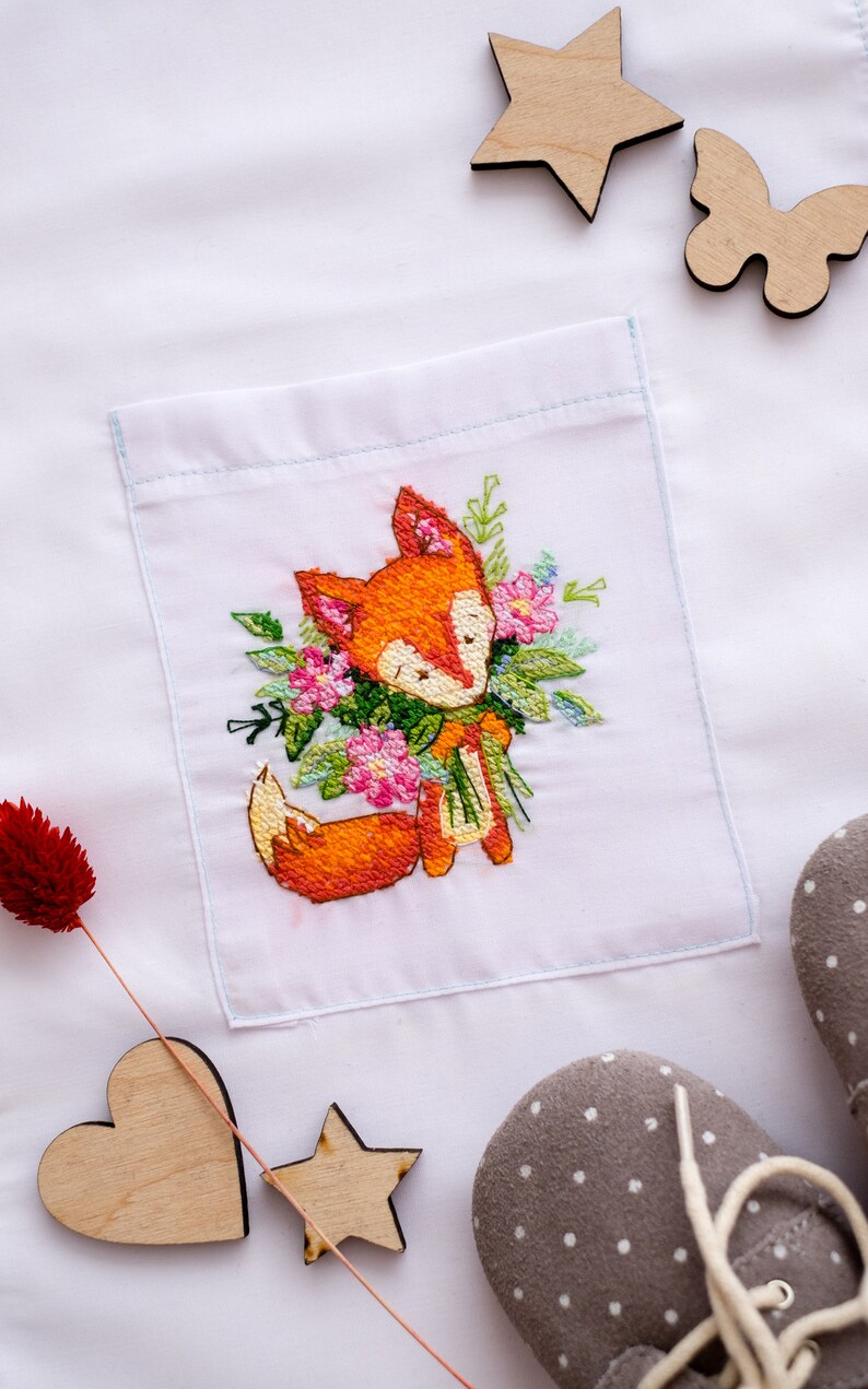 Bouquet depicting cute foxy stitching on clothes on dissolved canvas