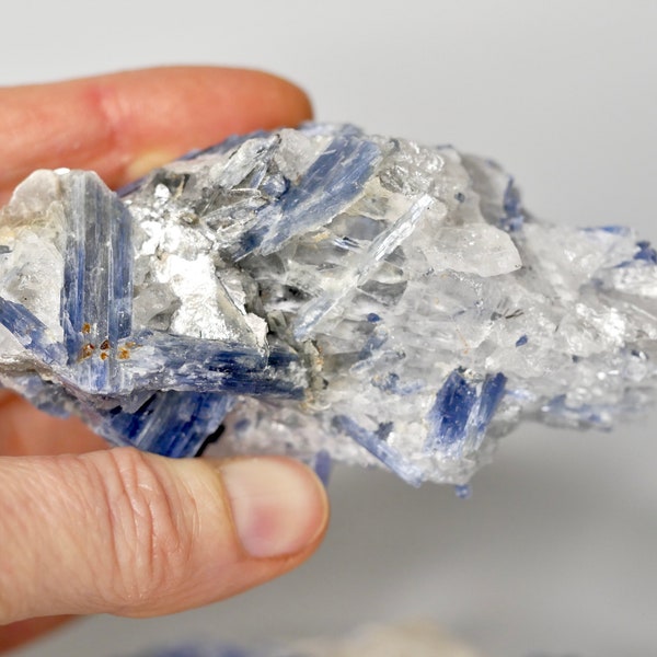 Blue Kyanite with Spessartine Garnet in Quartz