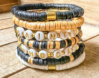 Pulseras del día del partido de los New Orleans Saints