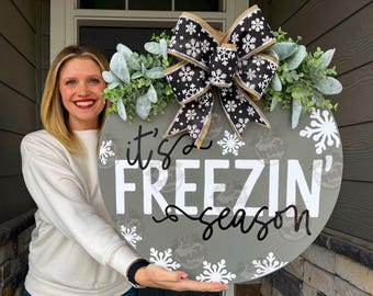 May include: A handmade wooden sign with the text "Welcome" in a playful font. The sign features a distressed white background and a dark brown frame, perfect for a front door or entryway.