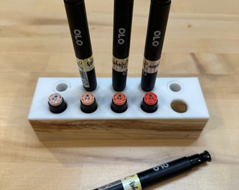 Cap and Marker Holder for OLO Markers we will refund shipping for this item if purchased with a grid.