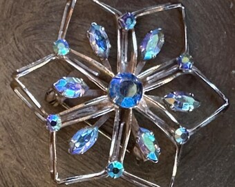 Beautiful Star Flower Brooch with multi facet stones