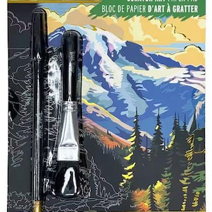 May include: Brea Reese scratch art paper pad with a mountain landscape design. Includes 14 sheets, 6 x 8 inches, a dual-tip stylus, and a brush. The package features a black background with white outlines and a colorful mountain scene.
