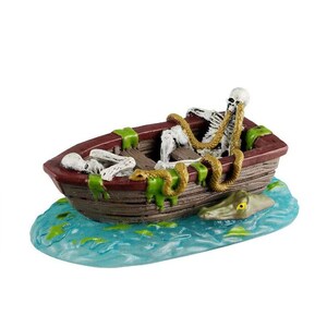 May include: A Halloween figurine depicting a skeleton in a maroon boat with green moss and gold snakes. Another skeleton lies in the boat, and a green alligator head emerges from the blue water.
