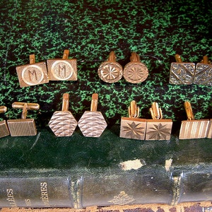 Set of 7 pairs of vintage french cuff links. Gold tone, gold filled vintage cuff links.