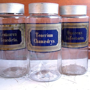 One very large Antique french glass pharmacy jar. Hand blown glass. Mouth blown glass. Antique glass pharmacy bottle. Curiosties cabinet.