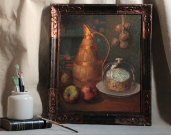 Antique french framed oil painting still life of a country kitchen. Wood and copper pitcher. Apples. Garlic. Glass dome. Kitchen still life