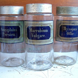 One very large Antique french glass pharmacy jar. Hand blown glass. Mouth blown glass. Antique glass pharmacy bottle. Curiosties cabinet.