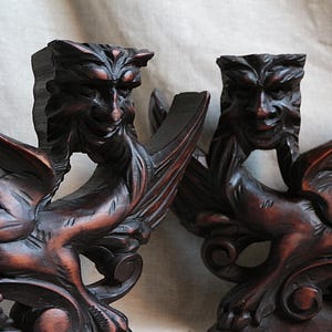 Pair of Antique french sculpted griffin corbels. Sculpted dragon shelf supports. Chateau Renaissance. Medieval. Architectural salvage.