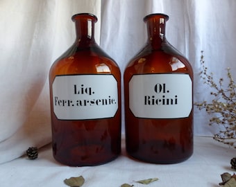 One enormous 5 litre vintage amber glass pharmacy bottle. Enamel label antique German amber glass pharmacy bottle. Jeanne d'Arc living