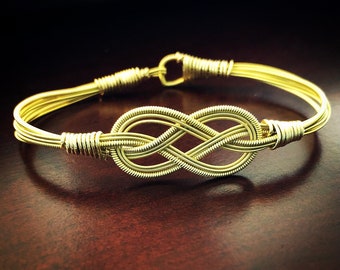 Gold color guitar string bracelet