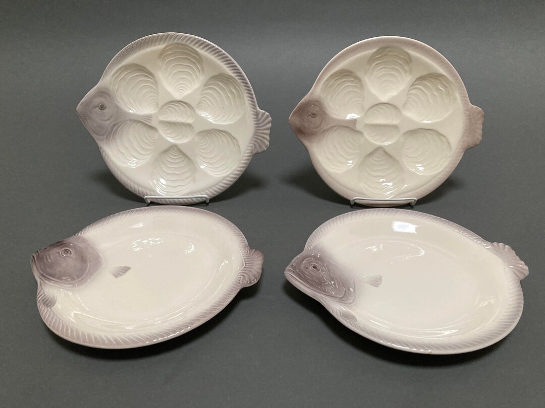 Four Vintage Fish Shaped Plates Including Two Oyster Plates
