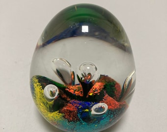 art glass paperweight, multicolor and clear glass with suspended bubbles, egg shape