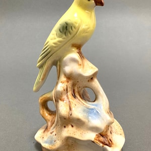 Vintage yellow parakeet on driftwood made in Brazil