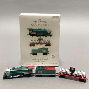 Hallmark Keepsake miniature Holiday Railroad Lionel Trains ornaments in box