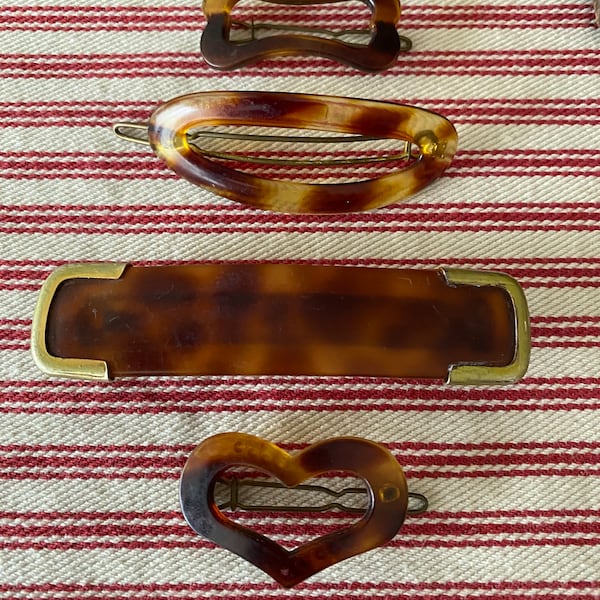 Vintage barrettes, set of 4,  from the 1960's, old fashioned wire clip, stay tight.  All made in France.   Faux tortoise shell celluloid.