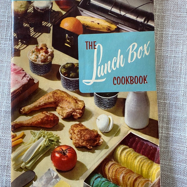 Vintage cook booklet.  Copyright  1955.  Retro Lunch Box Cookbook.  Charming 68 page soft cover book with a wide variety of recipes.