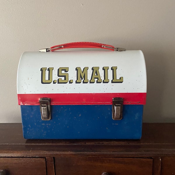 Vintage lunch box, US mail, mail box look alike, in good condition and very cool.  Has cute zip code man.  Great gift for postal worker!