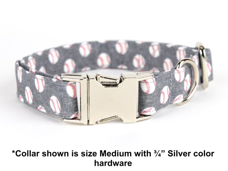 May include: A gray dog collar with white baseballs printed on it. The collar has a silver buckle and D-ring. *Collar shown is size Medium with 3/4" Silver color hardware*