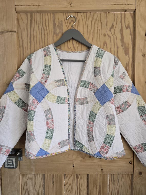 Patchwork quilted jacket ,reworked sustainable coat Handmade one off. vintage quilt.
