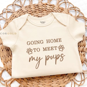Embroidered Going home to meet my pups Onesie® Protected by Dog New Best Friend Newborn Gift  Onesie® Custom Dog Name Baby Bodysuit