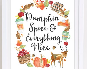 May include: A framed watercolor print with the text "Pumpkin Spice & Everything Nice" surrounded by fall-themed illustrations. The artwork includes a pumpkin, deer, coffee cup, pie, and apples.