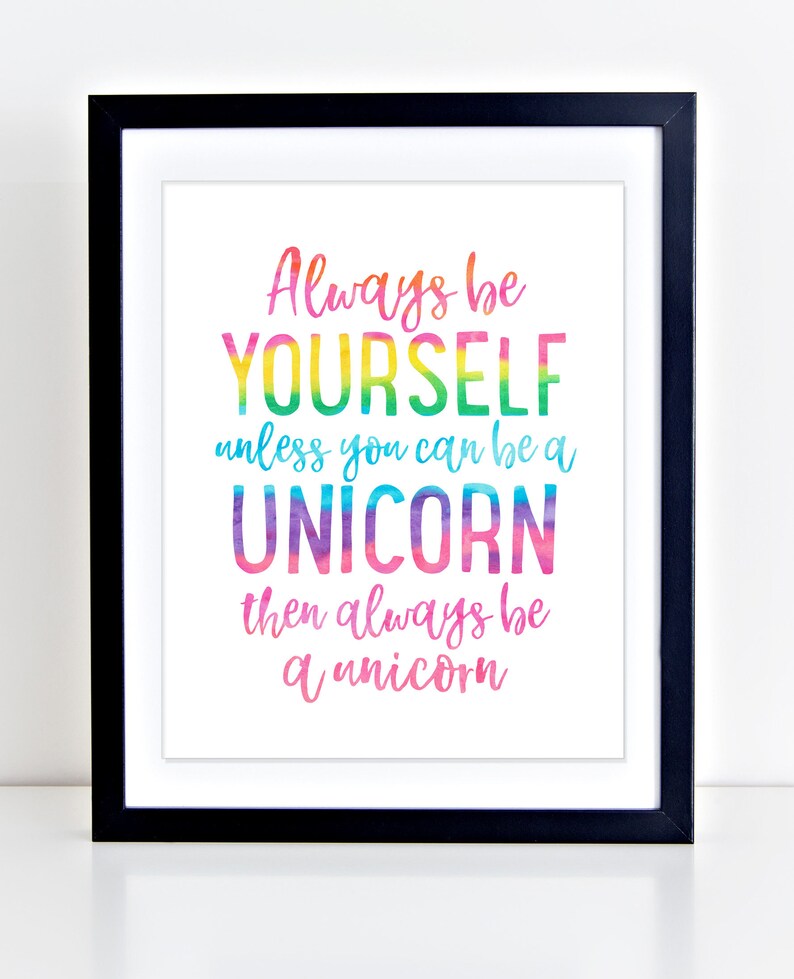May include: A framed print with a white background and a black frame. The print features colorful text that reads, "Always be YOURSELF unless you can be a UNICORN then always be a unicorn."