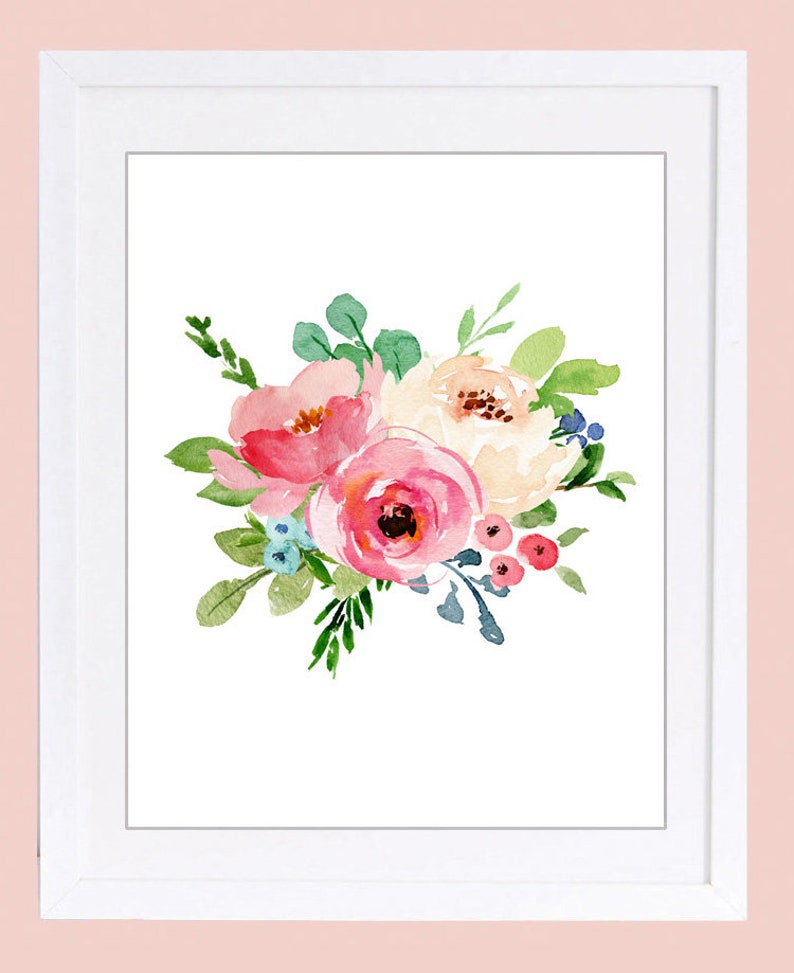 May include: A framed watercolour print showing a floral bouquet in shades of pink, peach, and white, with green leaves and small blue accents. The flowers are set against a white background within a white frame.