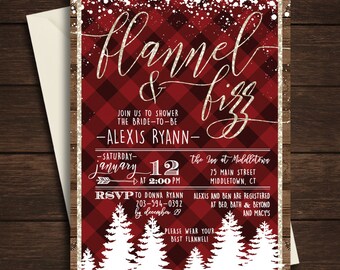 May include: A wedding shower invitation with a red and black plaid design. The invitation features the words "Flannel & Fizz" in gold script. White text includes the bride's name, date, time, and location. The bottom border has white pine trees.