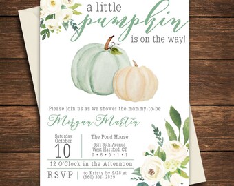 May include: A baby shower invitation with a watercolor illustration of two pumpkins, one green and one white, with white flowers and green leaves. The text reads "a little pumpkin is on the way!" and includes the details of the shower, including the date, time, location, and RSVP information.